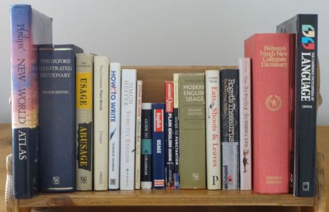 My bookshelf containing many books on English grammar